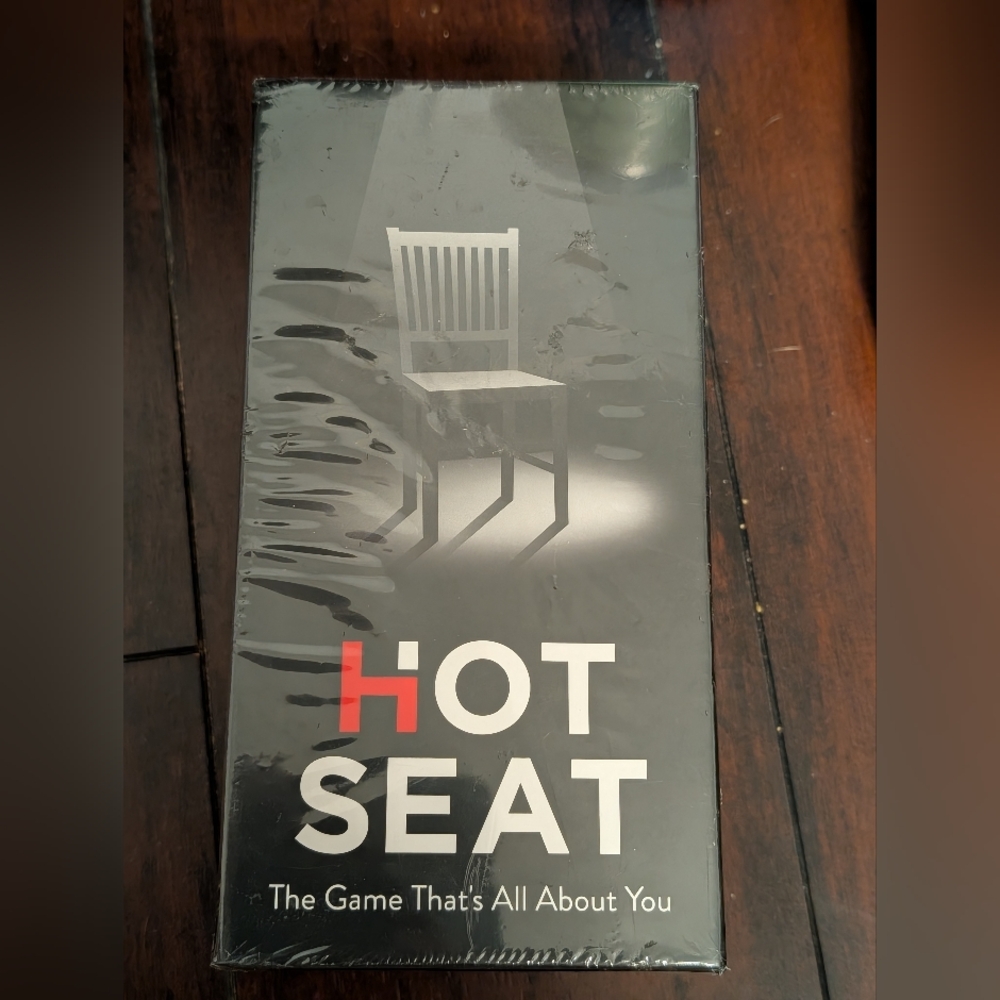 Black Card Game Hot Seat with Minimalist Design